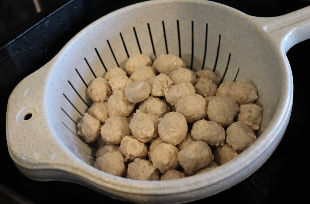 Pork balls with onion cooking